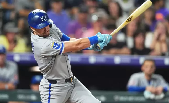 Kansas City Royals' Lane Thomas singles off Colorado Rockies starting pitcher Tomoyuki Sugano in the sixth inning of a baseball game Friday, July 31, 2026, in Denver. (AP Photo/David Zalubowski)