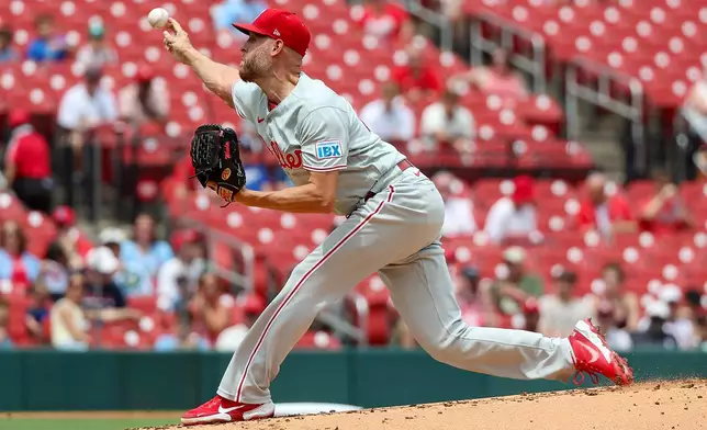 Philadelphia Phillies starting pitcher Zack Wheeler throws during the first inning of a baseball game against the St. Louis Cardinals Wednesday, Aug. 12, 2026, in St. Louis. (AP Photo/Scott Kane)