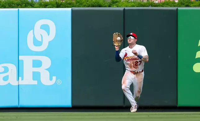 St. Louis Cardinals' Nathan Church catches a fly ball hit by Philadelphia Phillies' Luis Arraez during the ninth inning of a baseball game Wednesday, Aug. 12, 2026, in St. Louis. (AP Photo/Scott Kane)