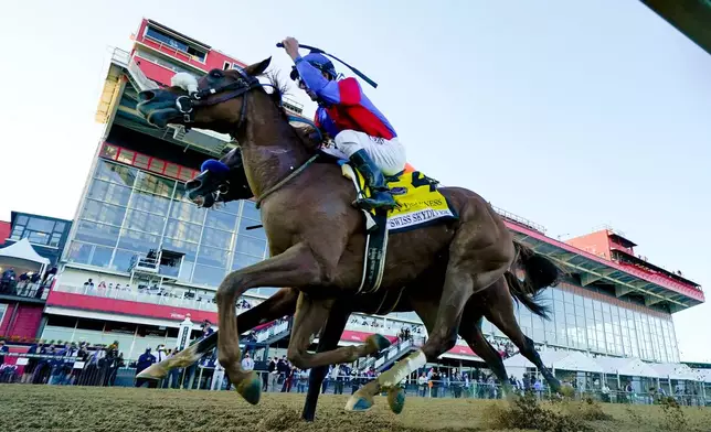 FILE - Swiss Skydiver (4), with Robby Albarado aboard, wins the 145th Preakness Stakes horse race at Pimlico Race Course in Baltimore, Oct. 3, 2020. (AP Photo/Steve Helber, File)