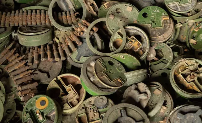 Piles of defused landmines and other remnants of war are seen in the Cambodia Landmine Museum in Siem Reap, Cambodia on Sunday, June 28, 2026. (AP Photo/Anton L. Delgado)