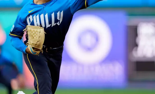 Philadelphia Phillies starting pitcher Jesus Luzardo delivers during the first inning of a baseball game against the St. Louis Cardinals, Friday, Aug. 21, 2026, in Philadelphia. (AP Photo/Chris Szagola)