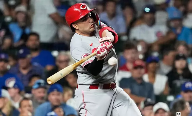 Cincinnati Reds' Sal Stewart hits a solo home run during the seventh inning of a baseball game against the Chicago Cubs in Chicago, Sunday, Aug. 30, 2026. (AP Photo/Nam Y. Huh)
