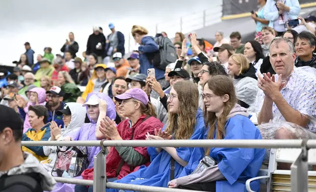 Fans wait for the inaugural Women's Professional Baseball League game between the Los Angeles Queens and the New York Heights, Saturday, Aug. 1, 2026, in Springfield, Ill. (AP Photo/Lexie Knight)