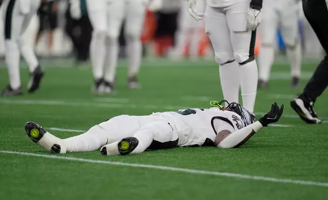 Philadelphia Eagles' Ja'Quinden Jackson lies on the field after an injury against the New England Patriots during the first half of an NFL preseason football game, Saturday, Aug. 22, 2026, in Foxborough, Mass. (AP Photo/Robert F. Bukaty)