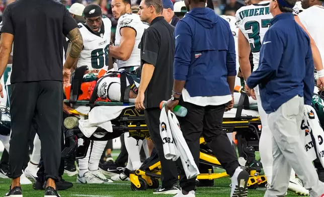 Philadelphia Eagles' Ja'Quinden Jackson is put on a stretcher after an injury against the New England Patriots during the first half of an NFL preseason football game, Saturday, Aug. 22, 2026, in Foxborough, Mass. (AP Photo/Robert F. Bukaty)