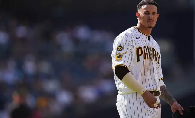 San Diego Padres third baseman Manny Machado looks on at the end of the eighth inning of a baseball game against the Pittsburgh Pirates Wednesday, Aug. 26, 2026, in San Diego. (AP Photo/Gregory Bull)