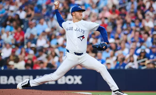 Toronto Blue Jays' Jameson Taillon pitches against the Boston Red Sox during the second inning of a baseball game in Toronto, Monday, Aug. 10, 2026. (Sammy Kogan/The Canadian Press via AP)