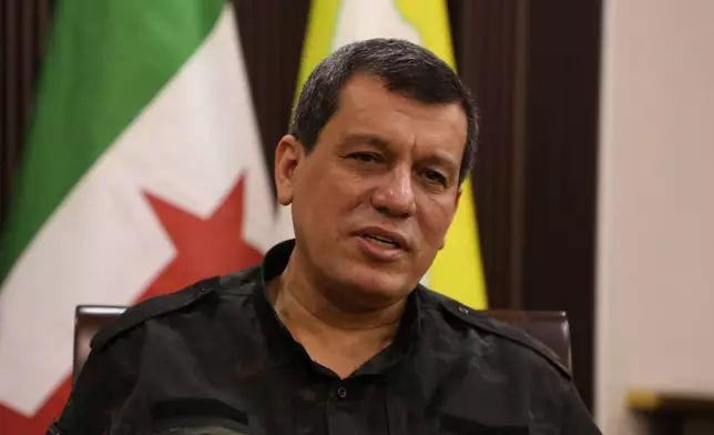 FILE - Mazloum Abdi, commander of the Kurdish-led and U.S.-backed Syrian Democratic Forces speaks during an interview in the northeastern city of Hassakeh, Syria, Oct. 16, 2025. (AP Photo/Hogir Al Abdo, File)
