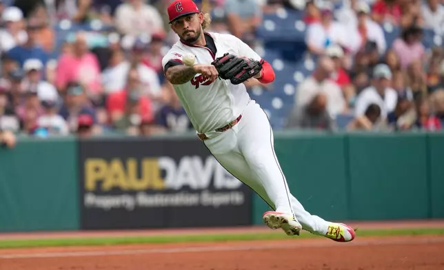 Cleveland Guardians third baseman Gabriel Arias throws out Arizona Diamondbacks' Tyler Locklear at first base in the third inning of a baseball game in Cleveland, Sunday, Aug. 2, 2026. (AP Photo/Sue Ogrocki)