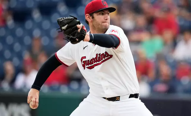 Cleveland Guardians' Gavin Williams pitches in the first inning of a baseball game against the Arizona Diamondbacks in Cleveland, Sunday, Aug. 2, 2026. (AP Photo/Sue Ogrocki)