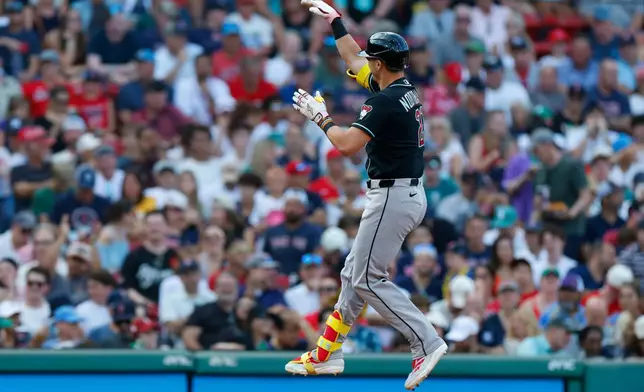 Arizona Diamondbacks' Lars Nootbaar gestures to the dugout after Nootbaar hit a two run home run during the sixth inning of a baseball game against the Boston Red Sox Wednesday, Aug. 19, 2026, in Boston. (AP Photo/CJ Gunther)