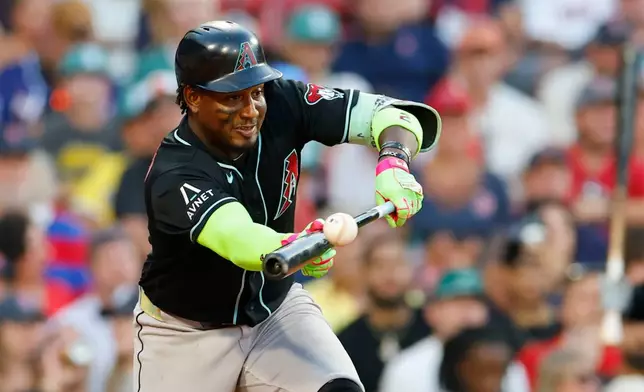 Arizona Diamondbacks' Geraldo Perdomo bunts the ball during the tenth inning of a baseball game against the Boston Red Sox Wednesday, Aug. 19, 2026, in Boston. (AP Photo/CJ Gunther)