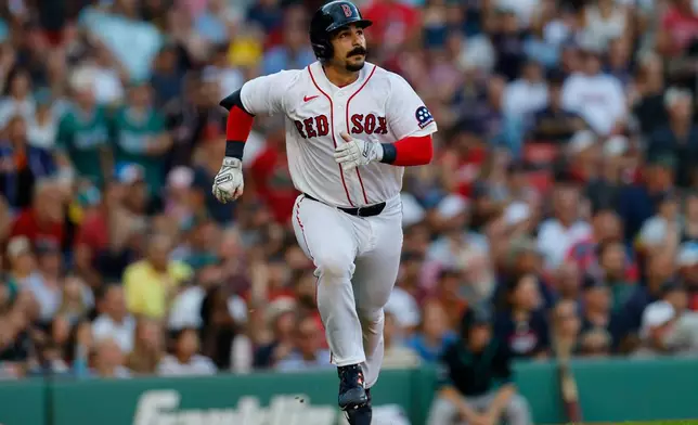 Boston Red Sox designated hitter Mickey Gasper watches his three run home run during the sixth inning of a baseball game against the Arizona Diamondbacks Wednesday, Aug. 19, 2026, in Boston. (AP Photo/CJ Gunther)