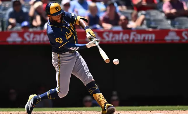 Milwaukee Brewers' Jackson Chourio hits a single during the eighth inning of a baseball game against the Los Angeles Angels, Sunday, Aug. 2, 2026, in Anaheim, Calif. (AP Photo/William Liang)