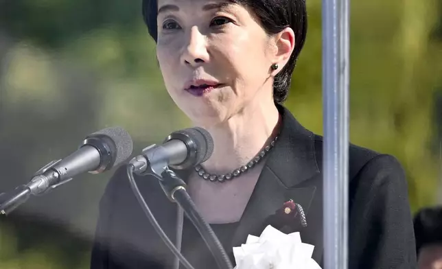 Japanese Prime Minister Sanae Takaichi delivers her speech during a ceremony to mark the anniversary of the U.S. atomic bombing at the Hiroshima Peace Memorial Park in Hiroshima, western Japan Thursday, Aug. 6, 2026. (Kyodo News via AP)