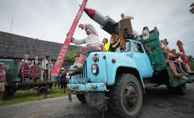 Estonia Seto Kingdom Day People attend mock military parade during the annual Seto Kingdom Day in Mikitamäe, south Estonia, Saturday, Aug. 1, 2026. (AP Photo/Sergei Grits)