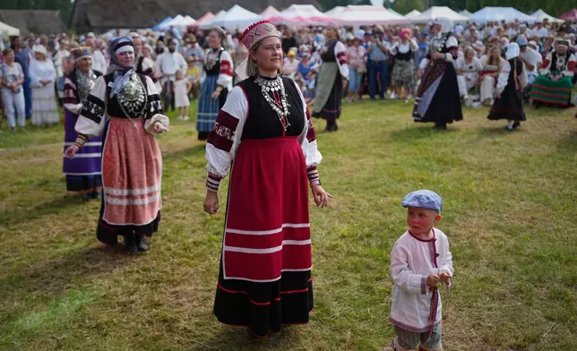 Estonia Seto Kingdom Day Women wearing traditional Seto costumes dance during the annual Seto Kingdom Day in Mikitamäe, south Estonia, Saturday, Aug. 1, 2026. (AP Photo/Sergei Grits)