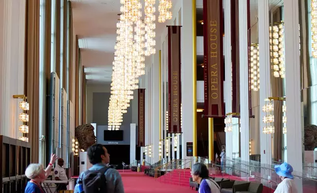 People are seen in the Grand Foyer at the Kennedy Center, Thursday, Aug. 27, 2026 in Washington. (Photo/Pablo Martinez Monsivais)