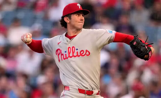 Philadelphia Phillies starting pitcher Andrew Painter throws to the plate during the first inning of a baseball game against the Los Angeles Angels, Friday, Aug. 28, 2026, in Anaheim, Calif. (AP Photo/Mark J. Terrill)