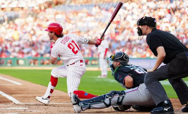 Philadelphia Phillies' Garrett Stubbs (21) watches his RBI-single off Miami Marlins pitcher Sandy Alcantara during the second inning of a baseball game, Wednesday, Aug. 19, 2026, in Philadelphia. (AP Photo/Derik Hamilton)