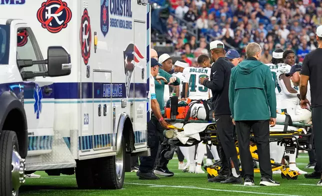 Philadelphia Eagles' Ja'Quinden Jackson is put into an ambulance after an injury against the New England Patriots during the first half of an NFL preseason football game, Saturday, Aug. 22, 2026, in Foxborough, Mass. (AP Photo/Robert F. Bukaty)