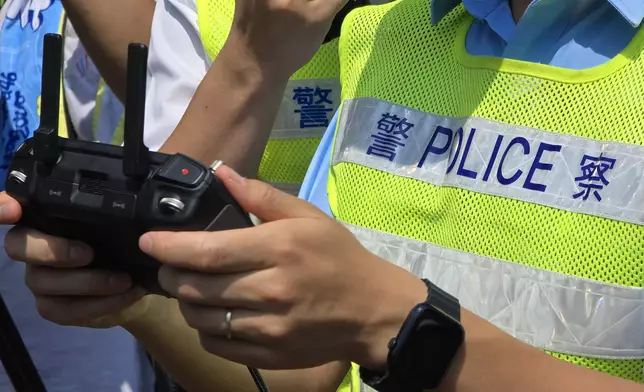 Operators remotely control the drones. Photo by Bastille Post