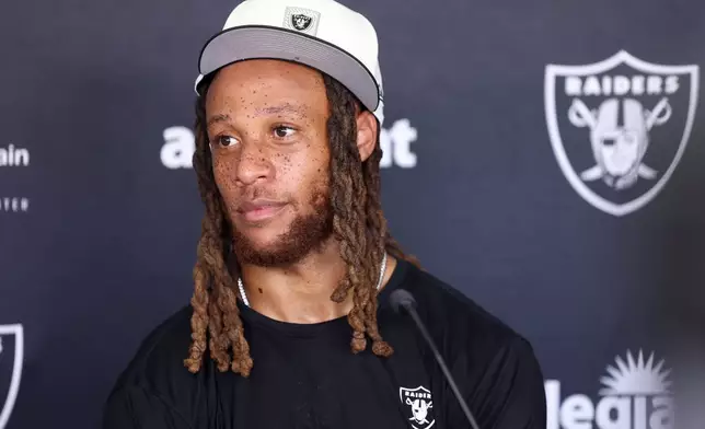 Las Vegas Raiders safety Eric Stokes (5) speaks during a news conference at the team's NFL football training camp, Thursday, July 30, 2026, in Henderson, Nev. (AP Photo/Ian Maule)