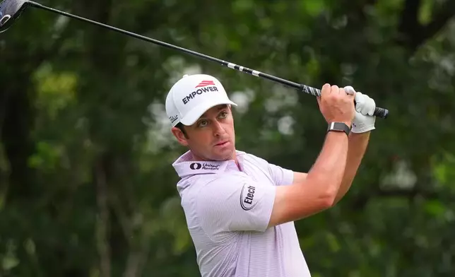 FILE - Davis Riley watches his tee shot on the ninth hole during the first round of the Charles Schwab Challenge golf tournament at Colonial Country Club in Fort Worth, Texas, Thursday, May 28, 2026. (AP Photo/LM Otero,File)
