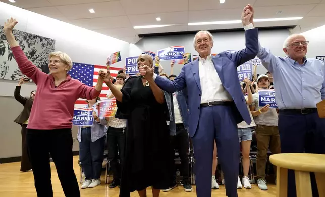 Sen. Elizabeth Warren, Rep. Ayanna Pressley, D-Mass., Sen. Ed Markey, D-Mass. and Sen. Bernie Sanders, I-VT., , left to right, wave to attendees during a Get Out the Vote event supporting Markey, Saturday, Aug. 29, 2026 in Boston. (AP Photo/Mark Stockwell)