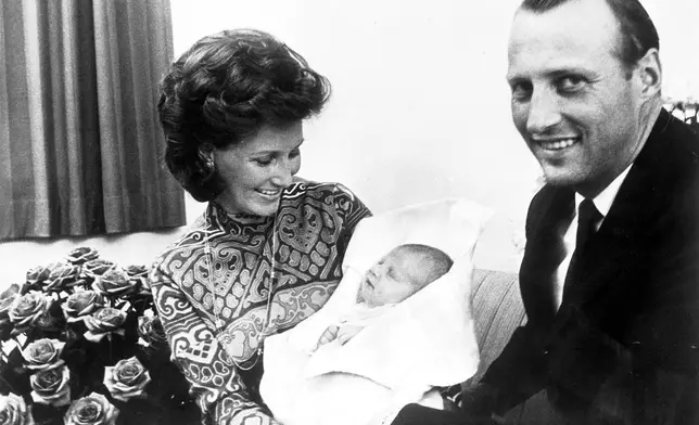 FILE - Norway's Crown Prince Harald, with his wife Crown Princess Sonja, present their new daughter Princess Martha Louise, in the Central Hospital, Oslo, Sept. 25, 1971, Princess Martha was born on Sept. 22. (AP Photo, file)