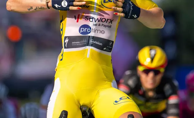 Netherlands' Lorena Wiebes of team SD Worx Protime celebrates crossing the finish line to win the second stage a 149 km from Aigle to Geneva during the Women's Tour de France (Tour de France Femmes), in Geneva, Switzerland, Sunday, Aug. 2, 2026. (Jean-Christophe Bott/Keystone via AP)