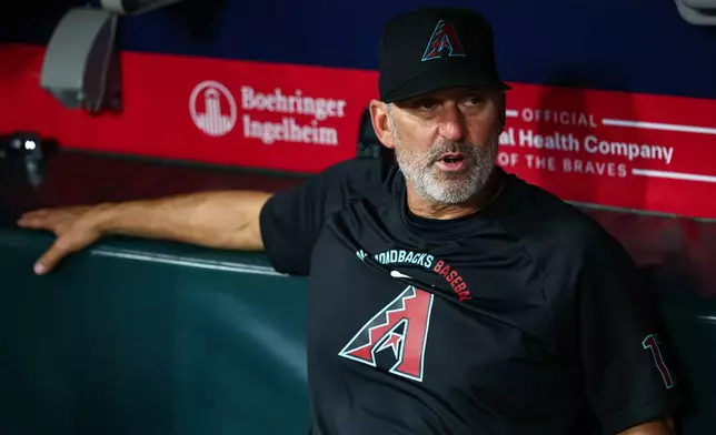 Arizona Diamondbacks manager Torey Lovullo looks on after a baseball game against the Atlanta Braves, Friday, Aug. 14, 2026, in Atlanta. (AP Photo/Colin Hubbard)