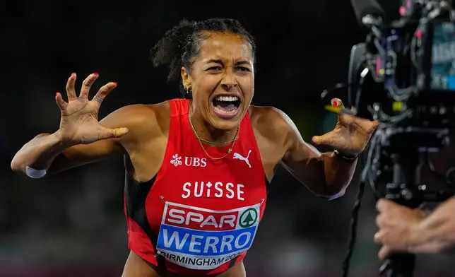 Audrey Werro of Switzerland celebrates after winning the gold medal in the women's 800 meters final at the European Athletics Championships in Birmingham, England, Friday, Aug. 14, 2026. (AP Photo/Petr David Josek)