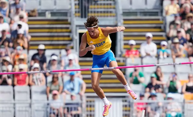 Armand Duplantis of Sweden makes an attempt in the men's pole vault qualifying at the European Athletics Championships in Birmingham, England, Friday, Aug. 14, 2026. (AP Photo/Matthias Schrader)