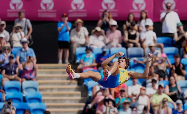 Armand Duplantis of Sweden makes an attempt in the men's pole vault qualifying at the European Athletics Championships in Birmingham, England, Friday, Aug. 14, 2026. (AP Photo/Matthias Schrader)