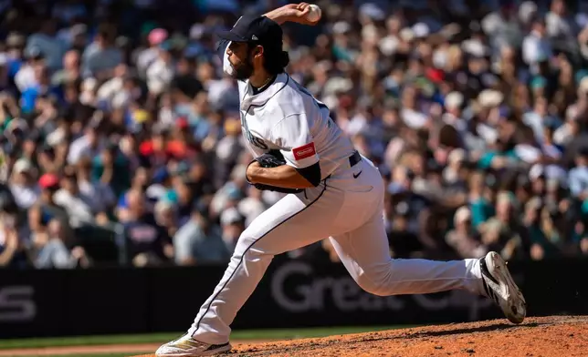 Seattle Mariners reliever Andres Munoz delivers a pitch during the eighth inning of a baseball game against the Minnesota Twins, Saturday, Aug. 1, 2026, in Seattle. (AP Photo/Stephen Brashear)