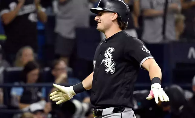 Chicago White Sox's Colson Montgomery celebrates after his home run during the sixth inning of a baseball game against the Tampa Bay Rays, Friday, July 31, 2026, in St. Petersburg, Fla. (AP Photo/Jason Behnken)