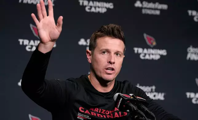 Arizona Cardinals head coach Mike LaFleur speaks during a news conference at the NFL football team's training camp, Wednesday, July 29, 2026, in Glendale, Ariz. (AP Photo/Ross D. Franklin)