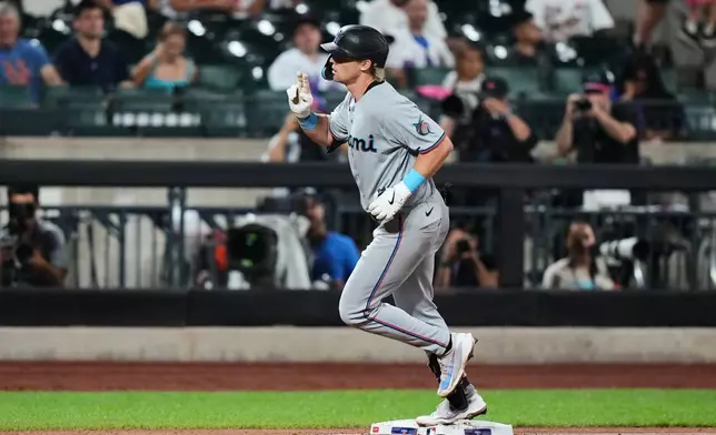 Miami Marlins' Kyle Stowers runs the bases after hitting a home run during the sixth inning of a baseball game against the New York Mets Friday, July 31, 2026, in New York. (AP Photo/Frank Franklin II)