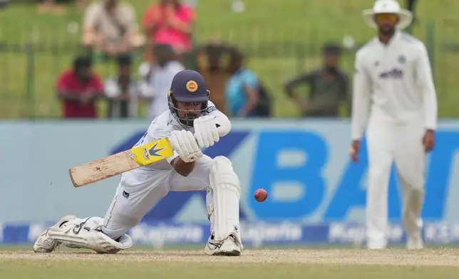 Sri Lanka's Pasindu Sooriyabandara plays a shot during day four of the second cricket test match between Sri Lanka and India in Colombo, Sri Lanka, Wednesday, Aug. 26, 2026. (AP Photo/Eranga Jayawardena)