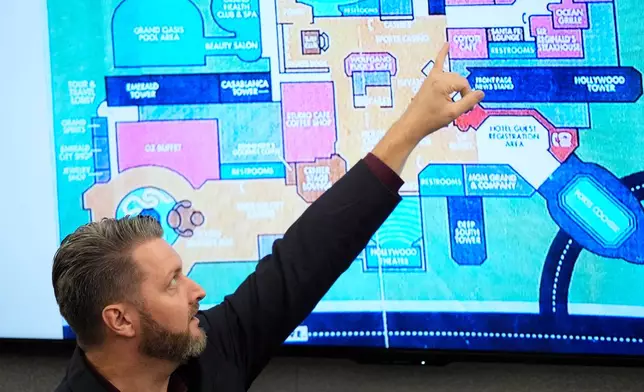 Michael Ingram, investigator for MGM Resorts, points to a map of the MGM Grand casino as he testifies during the murder trial of Duane "Keffe D" Davis related to the 1996 killing of rapper Tupac Shakur, at Clark County District Court Regional Justice Center in Las Vegas, on Tuesday, Aug. 18, 2026. (AP Photo/John Locher, Pool)