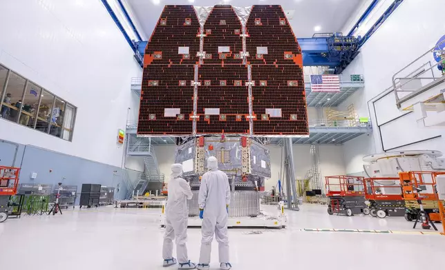 This photo provided by NASA shows technicians connecting the inner and outer segments of NASA's Nancy Grace Roman Space Telescope, Nov. 25, 2025, at NASA’s Goddard Space Flight Center in Greenbelt, Md. (Jolearra Tshiteya/NASA via AP)