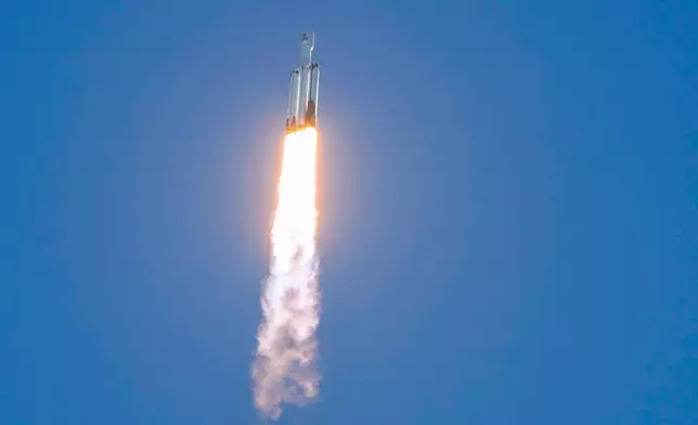 A SpaceX Falcon Heavy rocket with the space observatory Roman Telescope lifts off from launch complex 39A at the Kennedy Space Center in Cape Canaveral, Fla., Sunday, Aug. 30, 2026. (AP Photo/John Raoux)