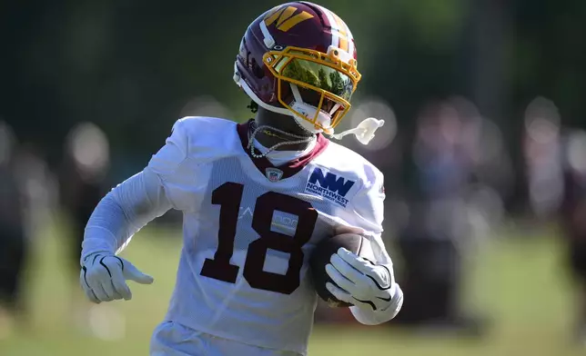 Washington Commanders wide receiver Stefon Diggs works out during practice at the team's NFL football training camp, Friday, Aug. 7, 2026 in Ashburn, Va. (AP Photo/Nick Wass)