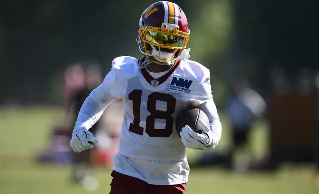 Washington Commanders wide receiver Stefon Diggs works out during practice at the team's NFL football training camp, Friday, Aug. 7, 2026 in Ashburn, Va. (AP Photo/Nick Wass)