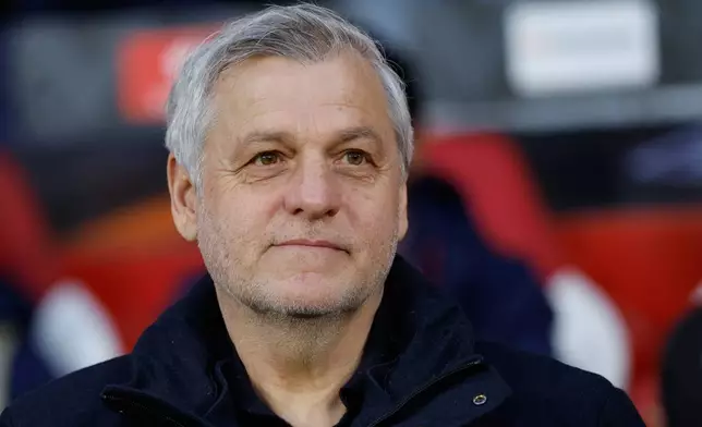 FILE - Lille's head coach Bruno Genesio stands before a first leg, round of 16 Europa League soccer match between Lille and Aston Villa in Lille, France, on Feb. 22, 2026. (AP Photo/Jean-Francois Badias, File)