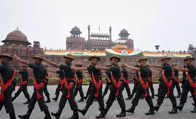 Soldiers march during the country's Independence Day celebrations at the 17th century Mughal-era Red Fort monument in New Delhi, India, Saturday, Aug. 15, 2026. (AP Photo/Sanjeev Rastogi)