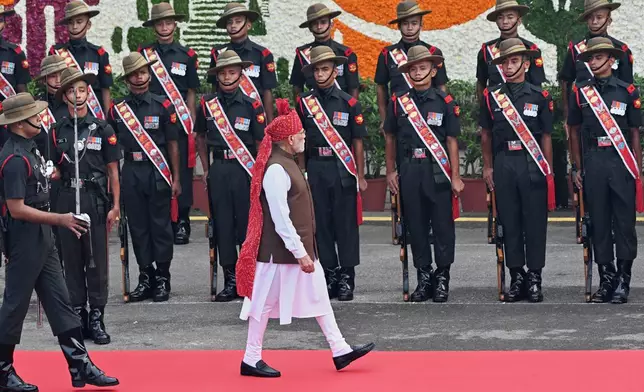 Indian Prime Minister Narendra Modi receives a ceremonial guard of honor as he arrives to address the nation from the rampart of the Red Fort monument during the country's Independence Day celebrations in New Delhi, India, Saturday, Aug. 15, 2026. (AP Photo)