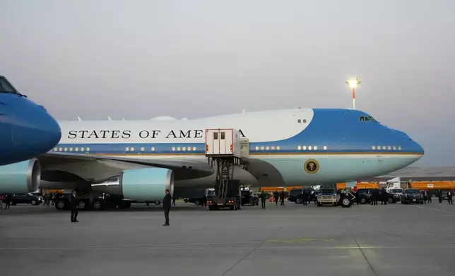 FILE - A catering truck is parked at Air Force One on the tarmac as the motorcade carrying U.S. President Donald Trump arrives to depart following the NATO summit at Ankara International Airport in Ankara, Turkey, Wednesday, July 8, 2026. (AP Photo/Alex Brandon)